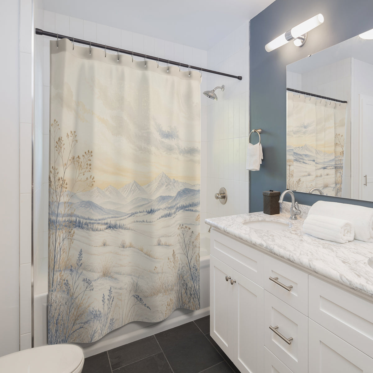 Ivory frost meadow with blue botanicals and mountains shower curtain beside a white vanity