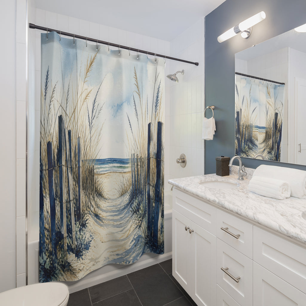 Navy dune fencing along a sandy path to the ocean shower curtain installed beside a white vanity