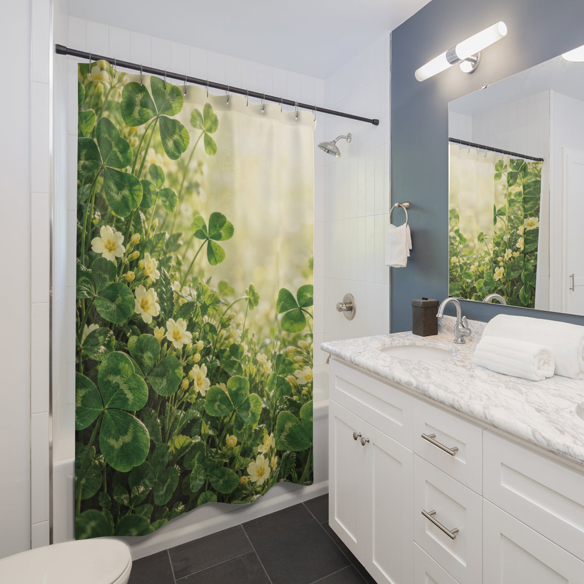 Green clover and pale yellow primrose meadow shower curtain beside a white vanity