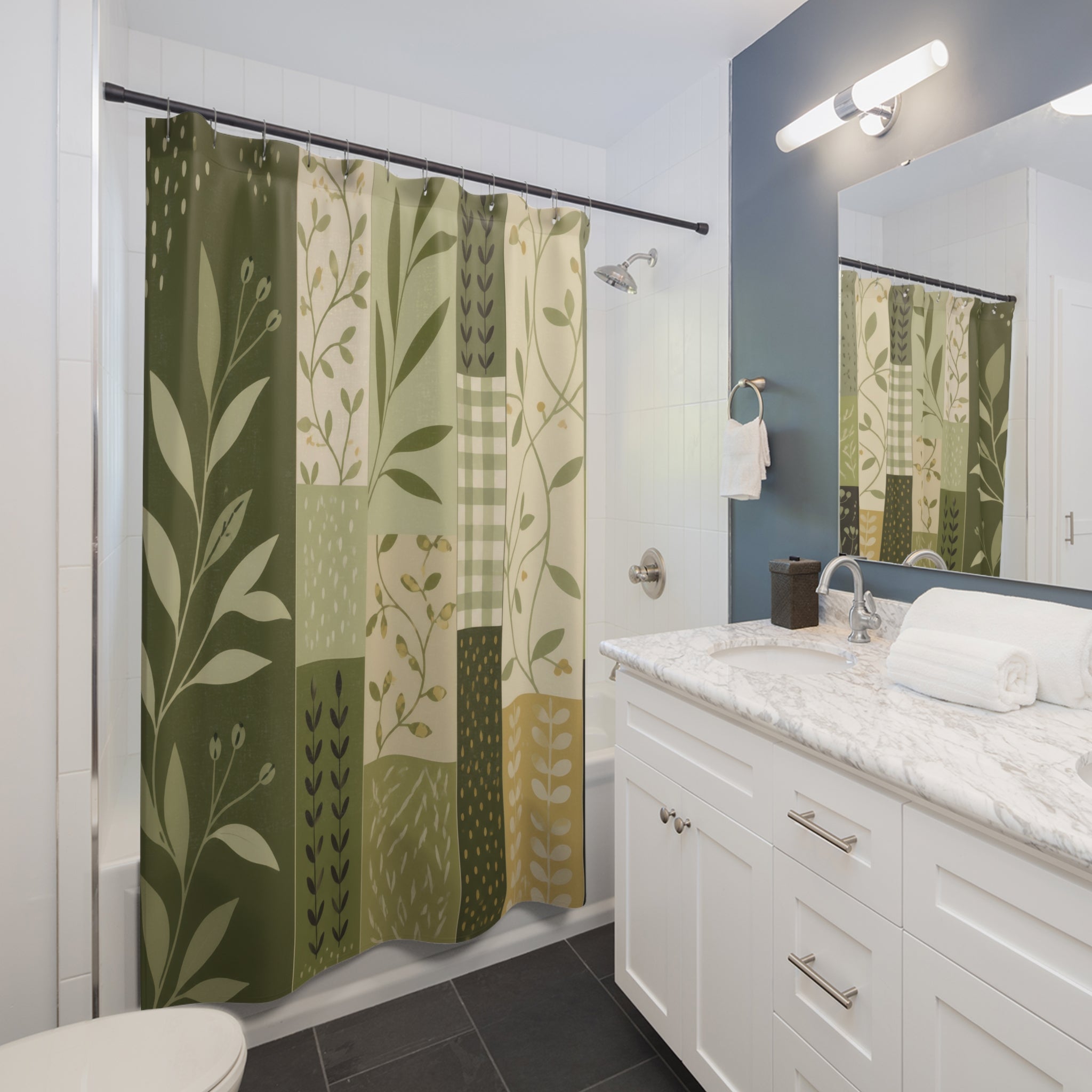 Olive botanical patchwork strips shower curtain beside a white vanity