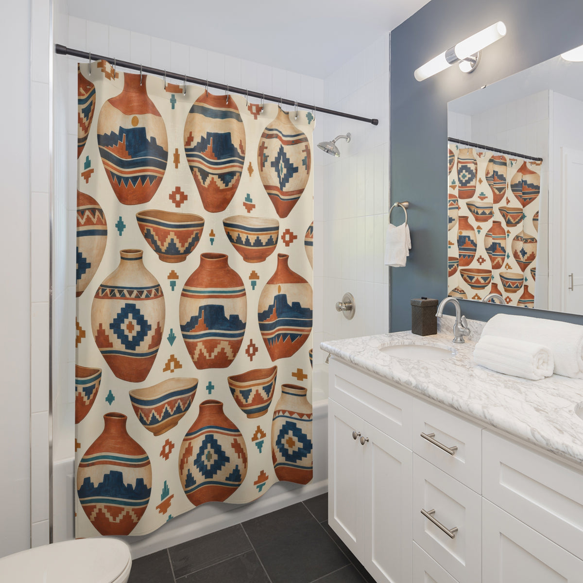 Terracotta pottery with blue mesas and stepped diamonds shower curtain beside a white vanity