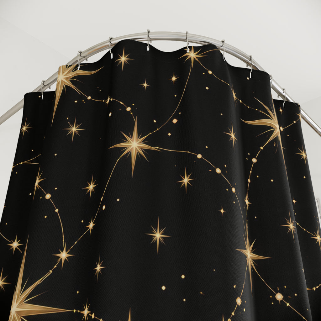 Gold radiant stars linked by fine paths on black shower curtain with close-up print, hooks, and folds
