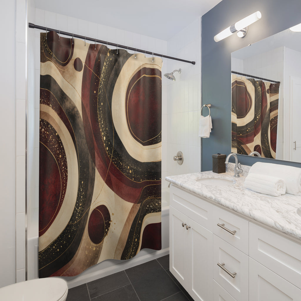 Burgundy circles with cream bands and gold-colored flecks shower curtain beside a white vanity