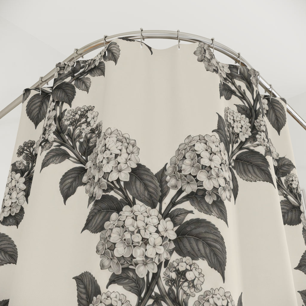 Charcoal hydrangea wreaths and leaves on warm cream shower curtain with close-up print, hooks, and folds