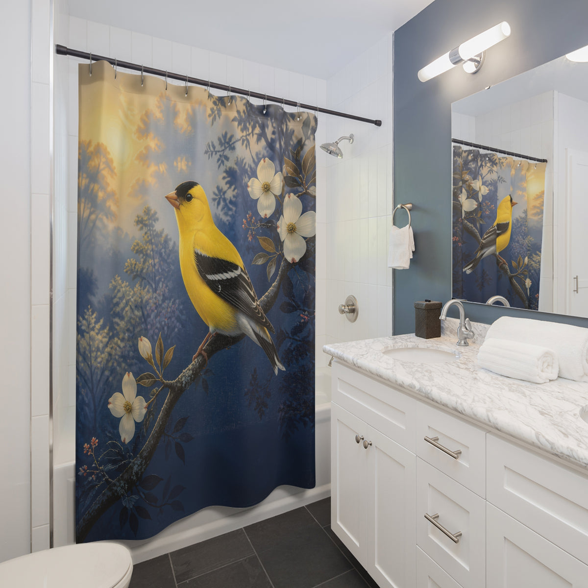 Golden yellow songbird on an indigo branch shower curtain beside a white vanity