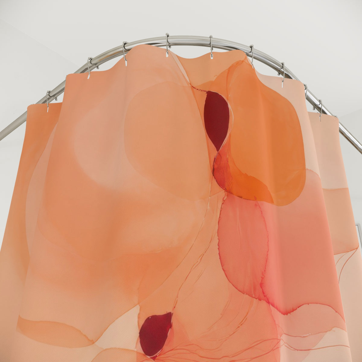 Peachy translucent apricot abstract shapes shower curtain with close-up print, hooks, and folds
