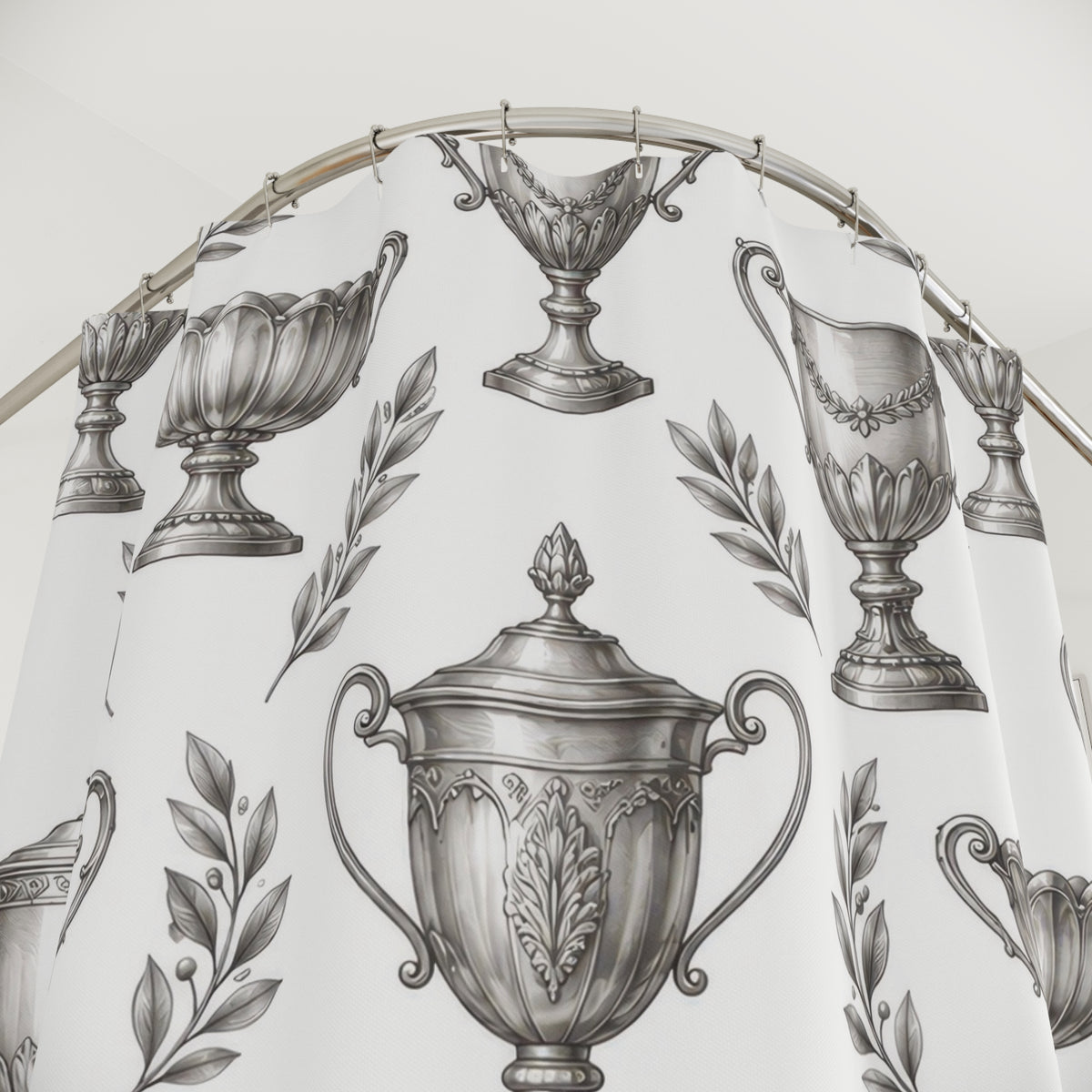 Silver trophy cups and gray laurel sprigs shower curtain with close-up print, hooks, and folds
