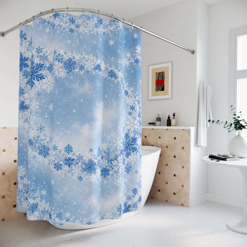 Blue orbital snowfall shower curtain beside a freestanding tub