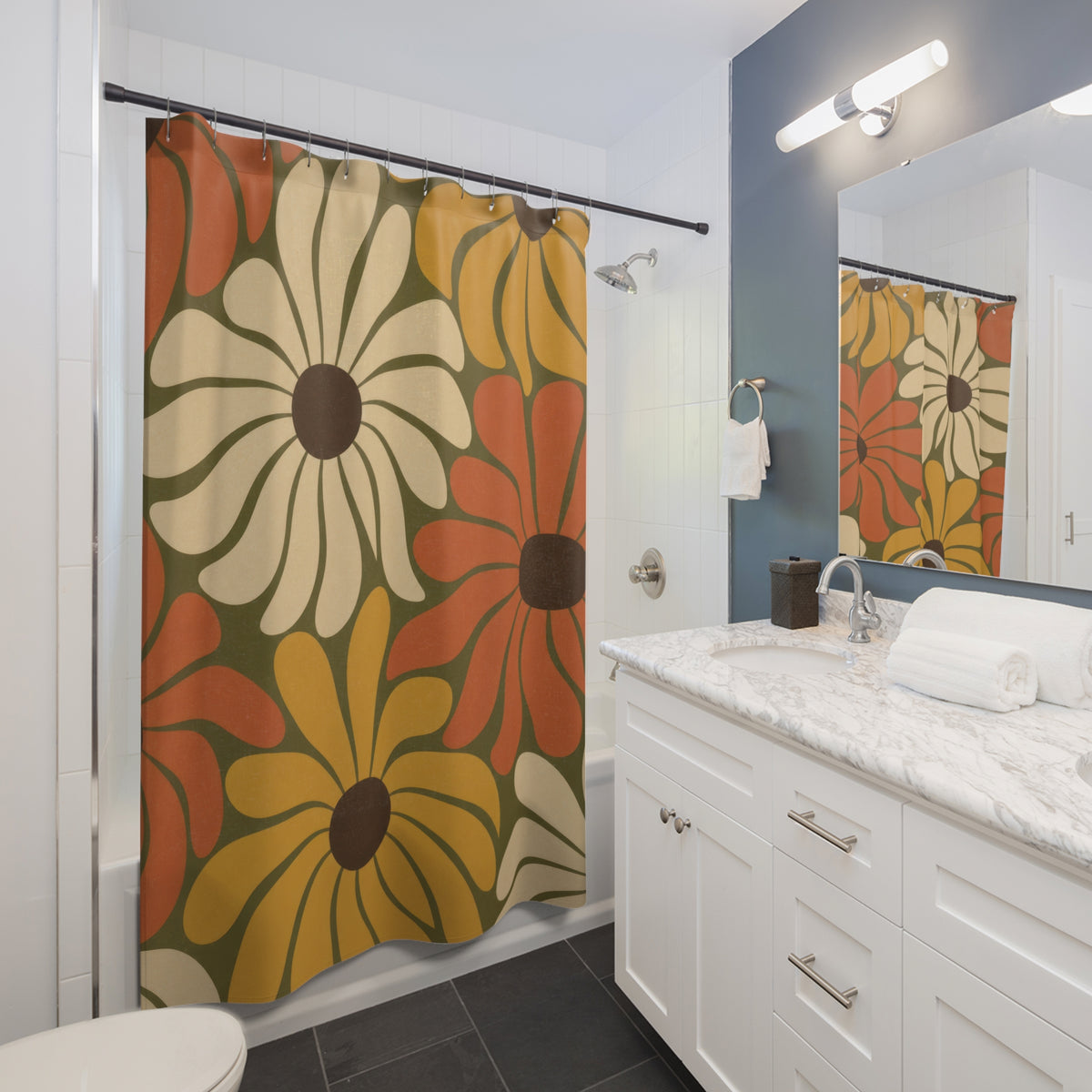 Terracotta mustard and cream daisy pattern shower curtain beside a white vanity