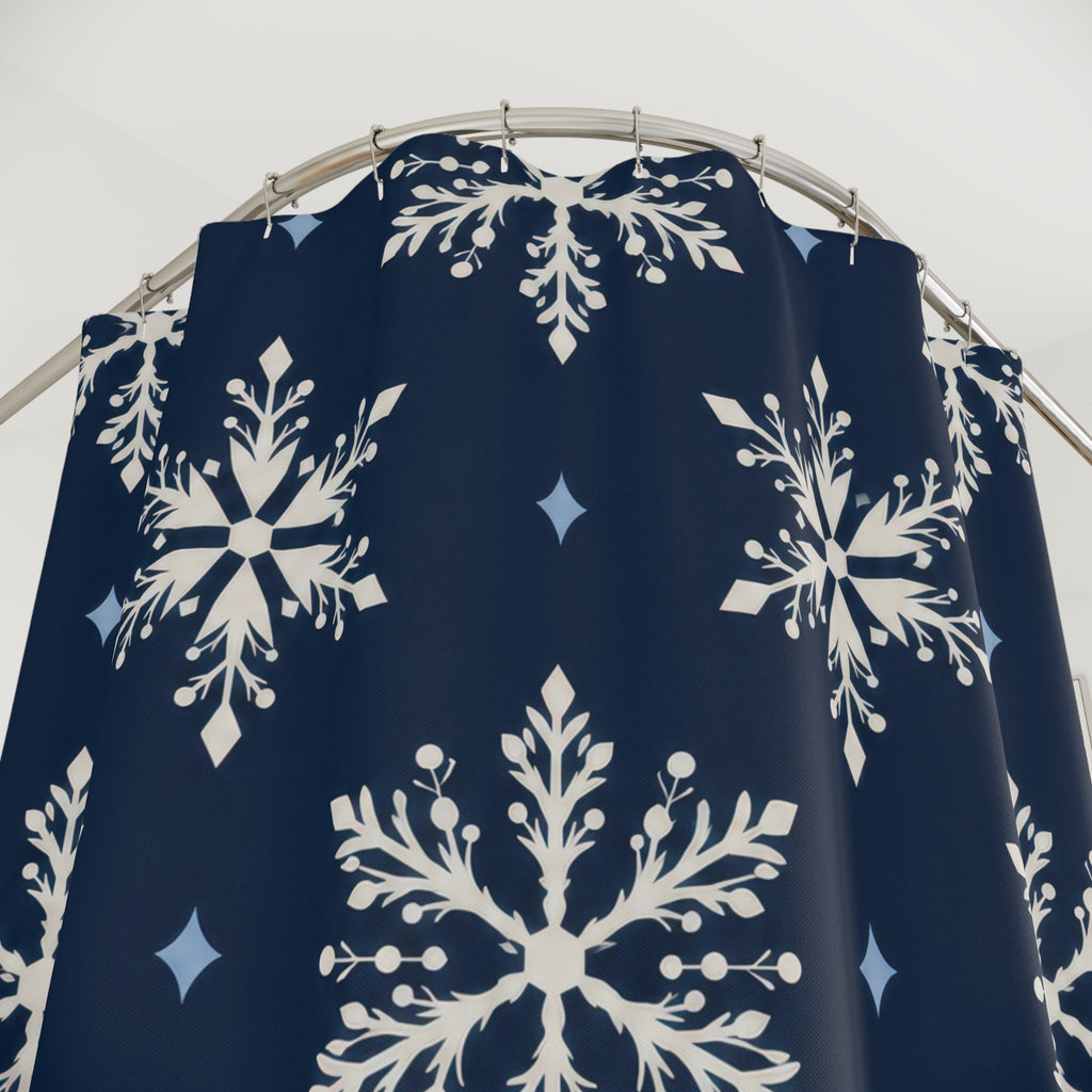 Ivory snowflakes and pale blue diamonds on navy shower curtain with close-up print, hooks, and folds