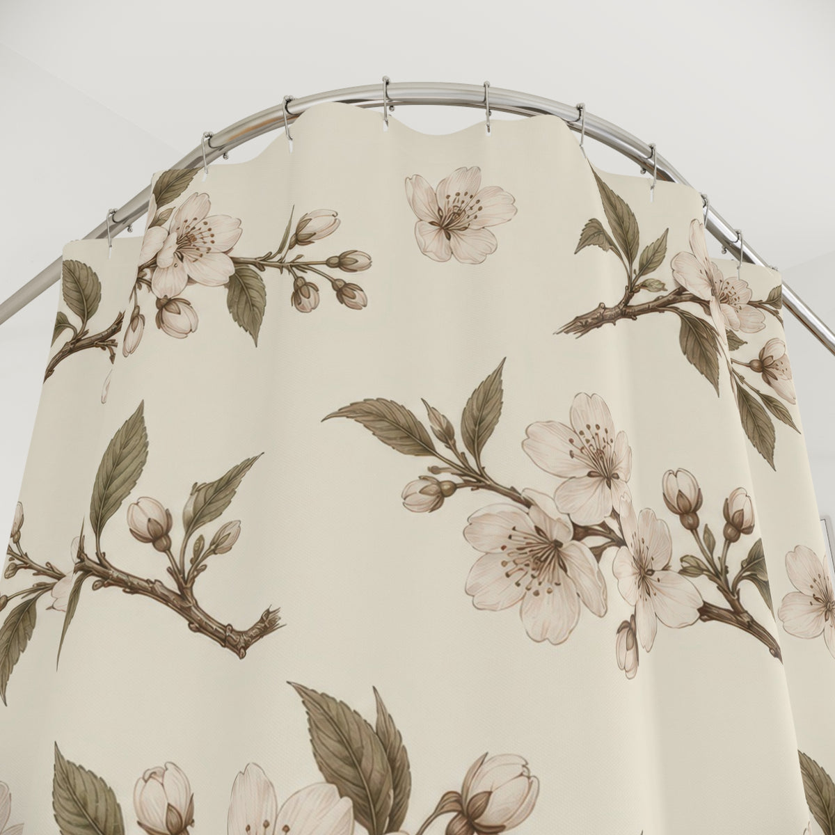 Sepia cherry blossom boughs with olive leaves on ivory shower curtain with close-up print, hooks, and folds