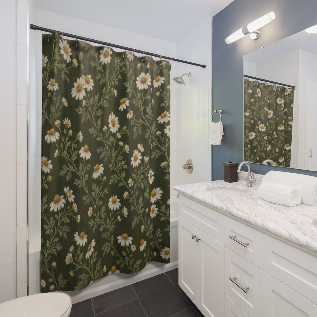 Cream chamomile flowers on olive shower curtain beside a white vanity