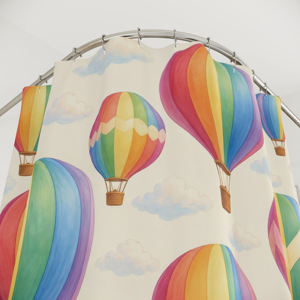 Pastel rainbow hot air balloons and clouds on cream shower curtain with close-up print, hooks, and folds