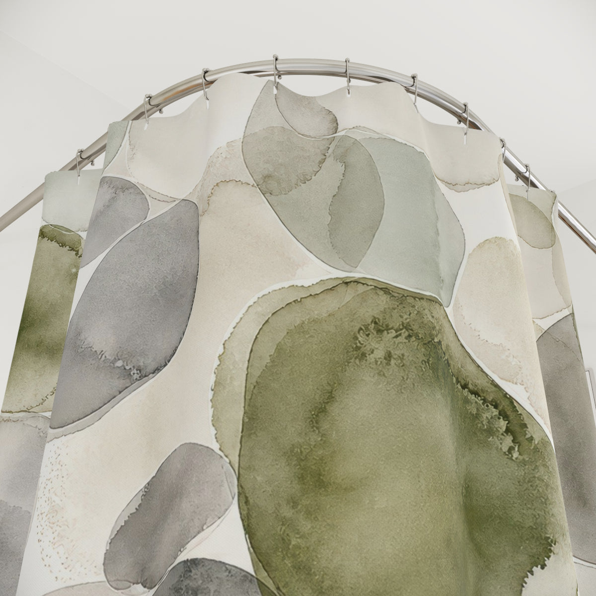Green Grey Watercolor Circle abstract shower curtain with close-up print, hooks, and folds