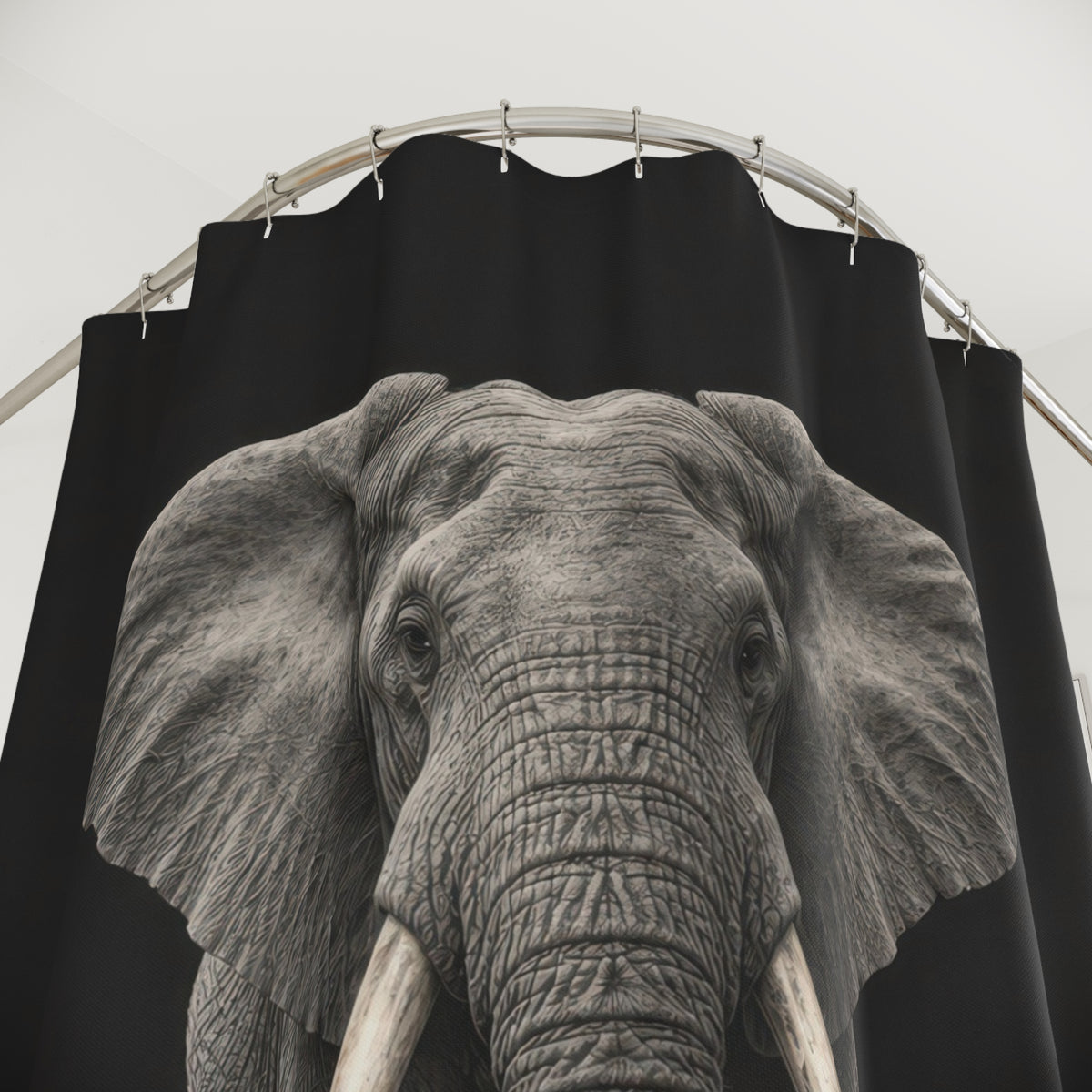 Gray elephant on charcoal shower curtain with close-up print, hooks, and folds