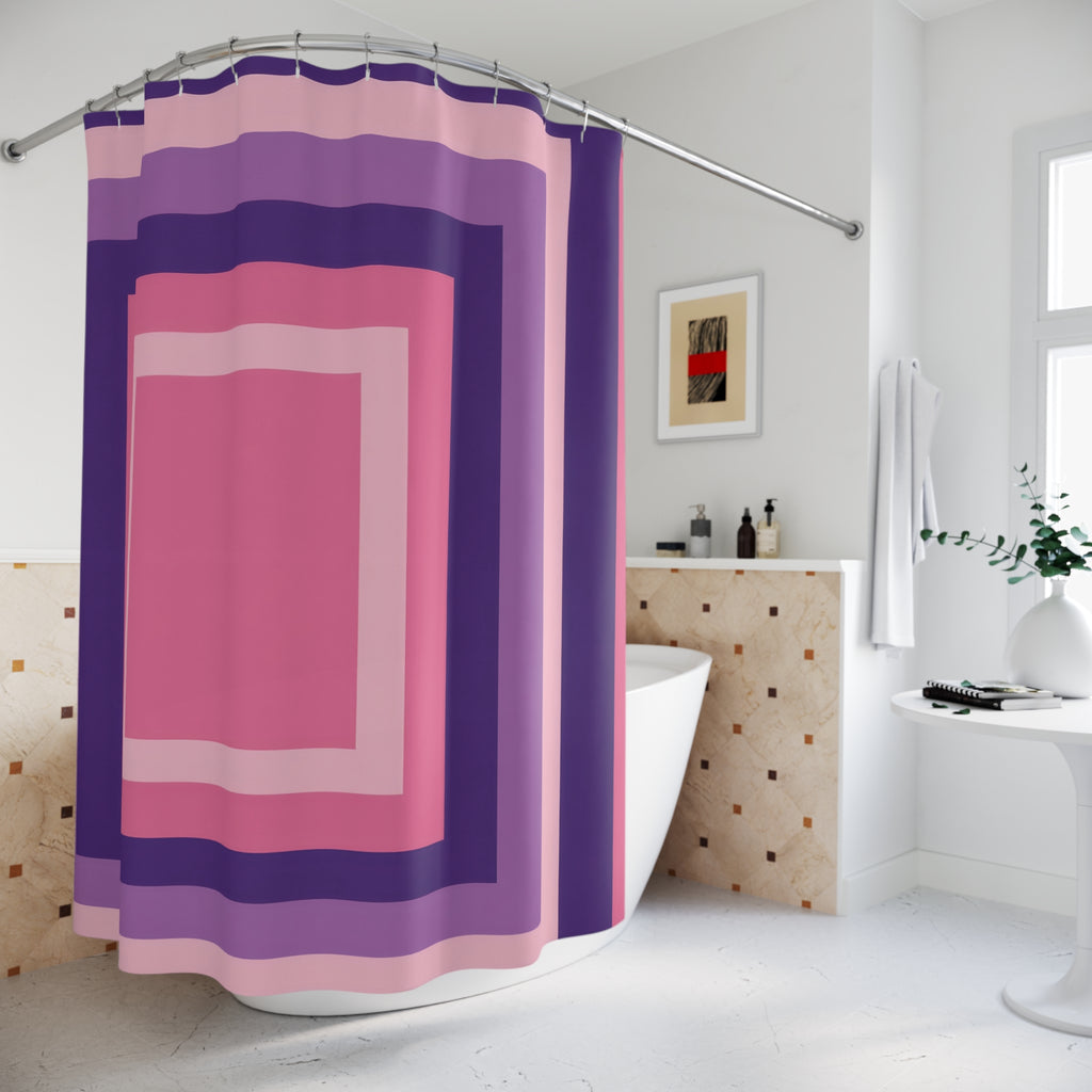 Nested rectangular stripes in pink, orchid and deep violet shower curtain beside a freestanding tub