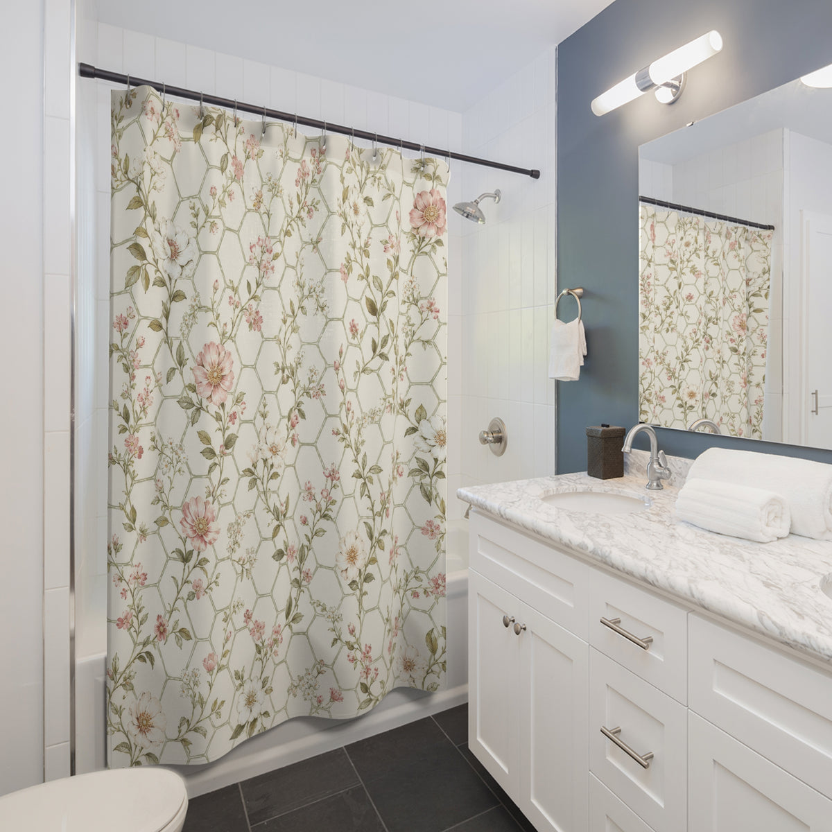 Pale Honeycomb Lattice Flower pink shower curtain beside a white vanity