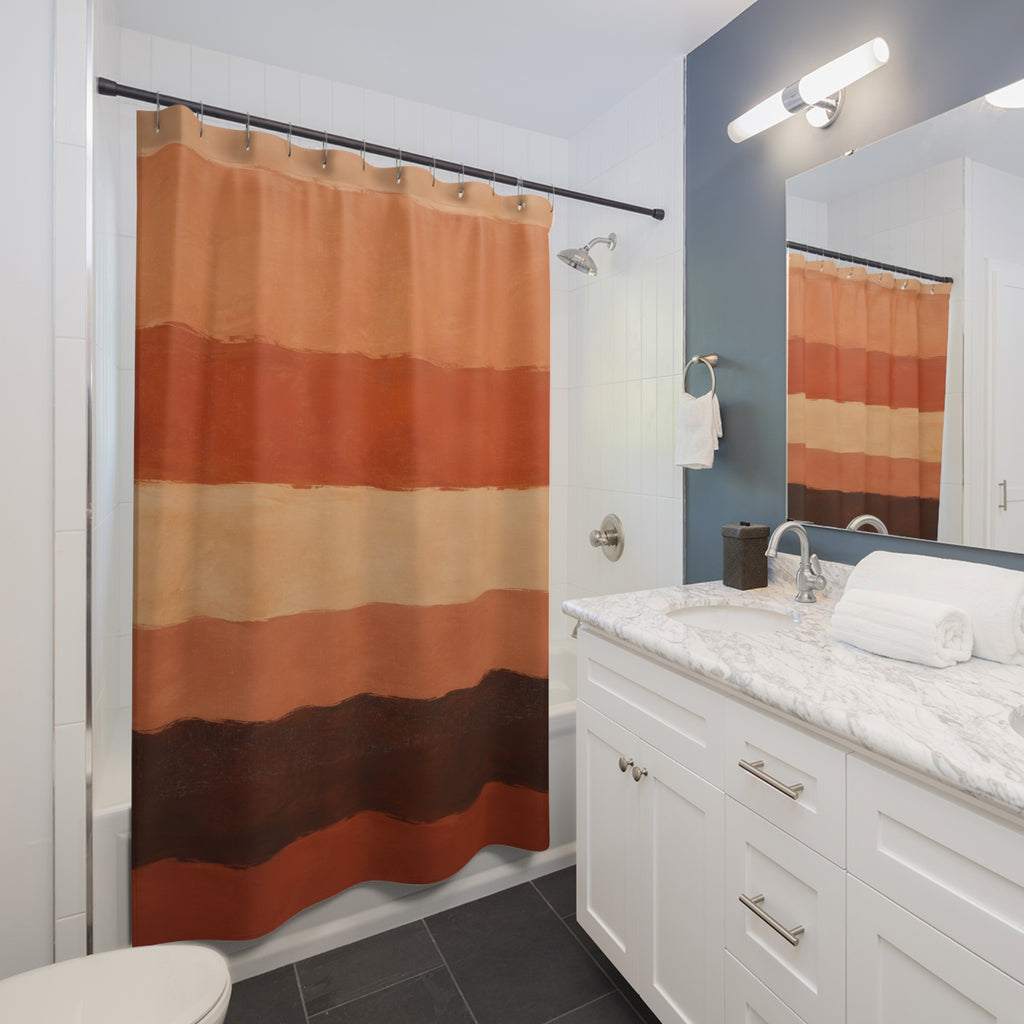 Painterly wide terracotta cream and umber horizontal stripes shower curtain beside a white vanity