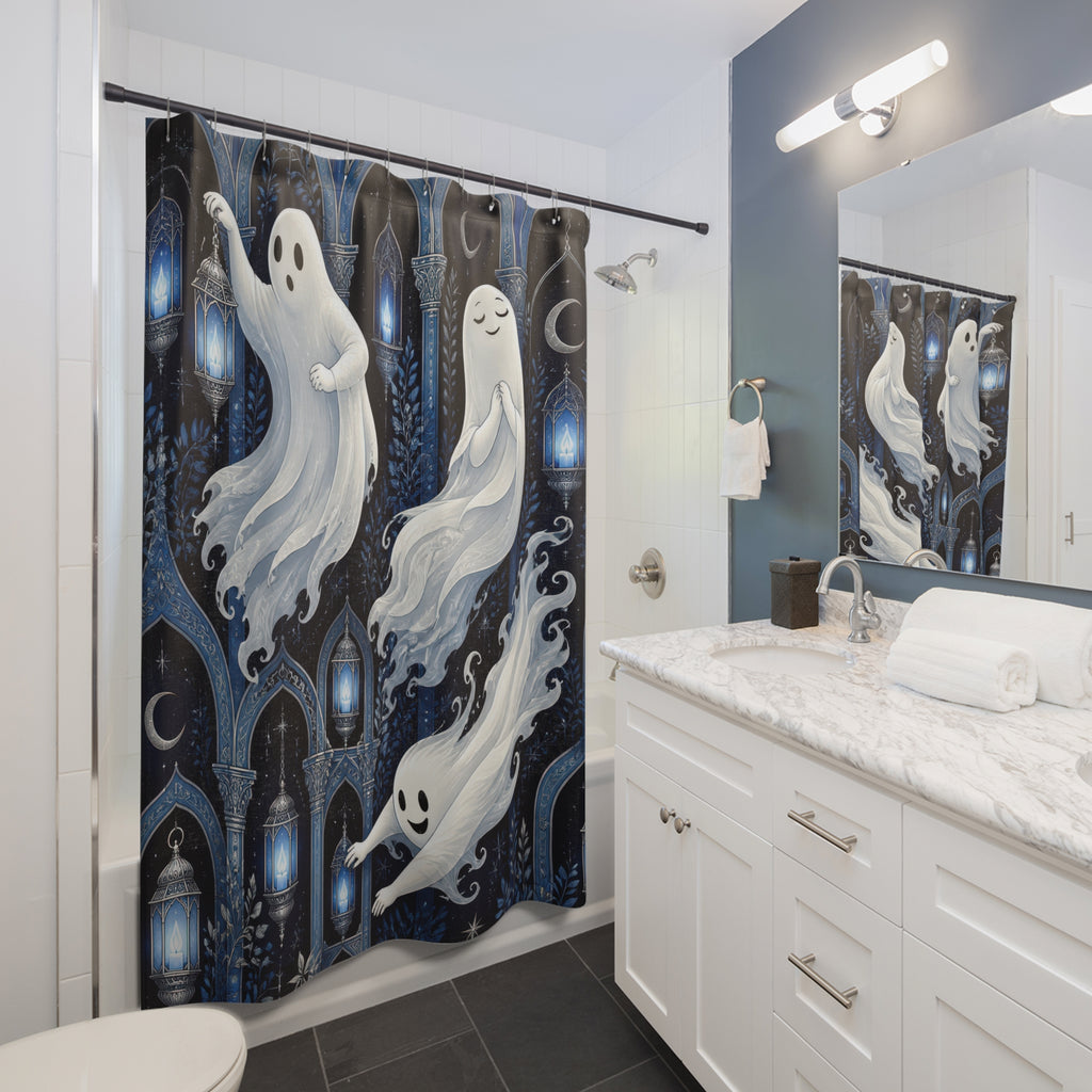 White ghosts in a light blue lantern arcade shower curtain beside a white vanity
