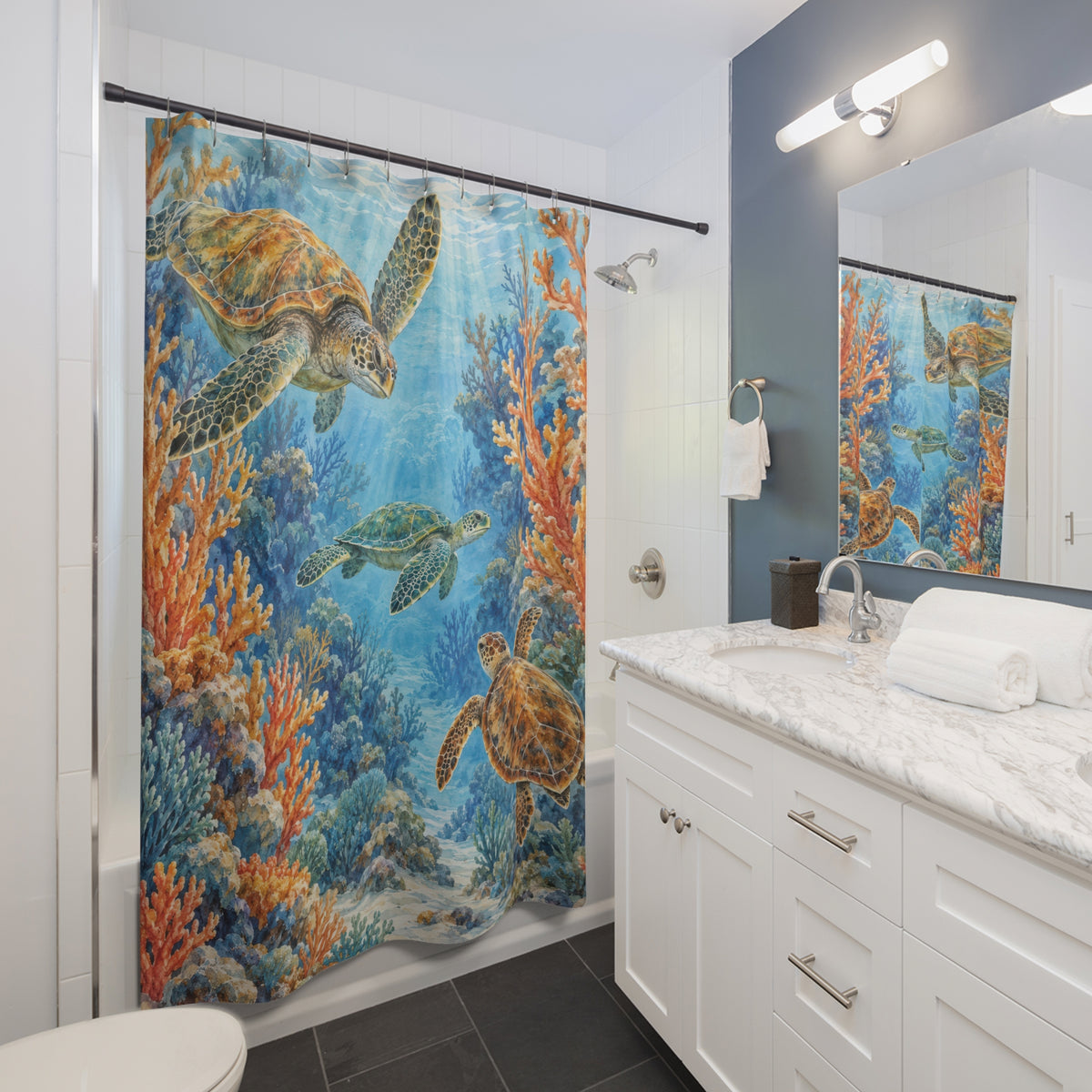 Sea turtles with orange coral and blue water shower curtain beside a white vanity