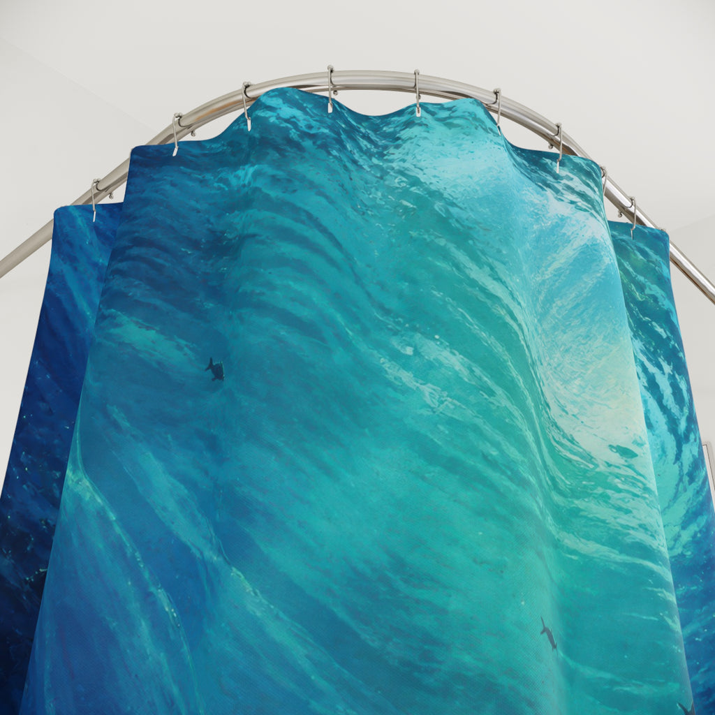 Deep indigo underwater currents with turquoise sunlight shower curtain with close-up print, hooks, and folds