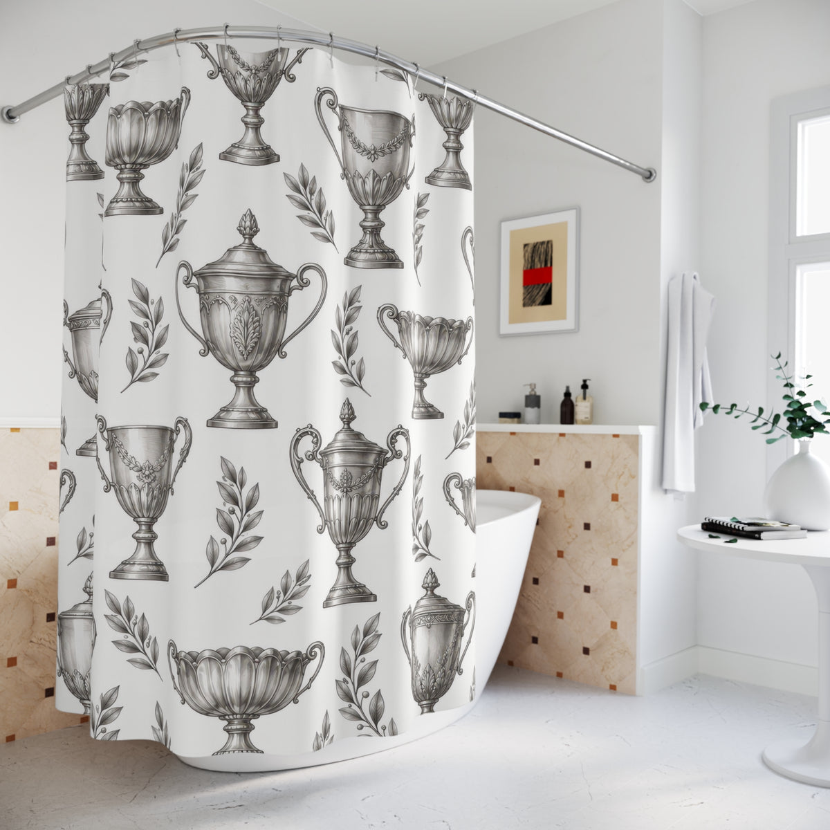 Silver trophy cups and gray laurel sprigs shower curtain beside a freestanding tub