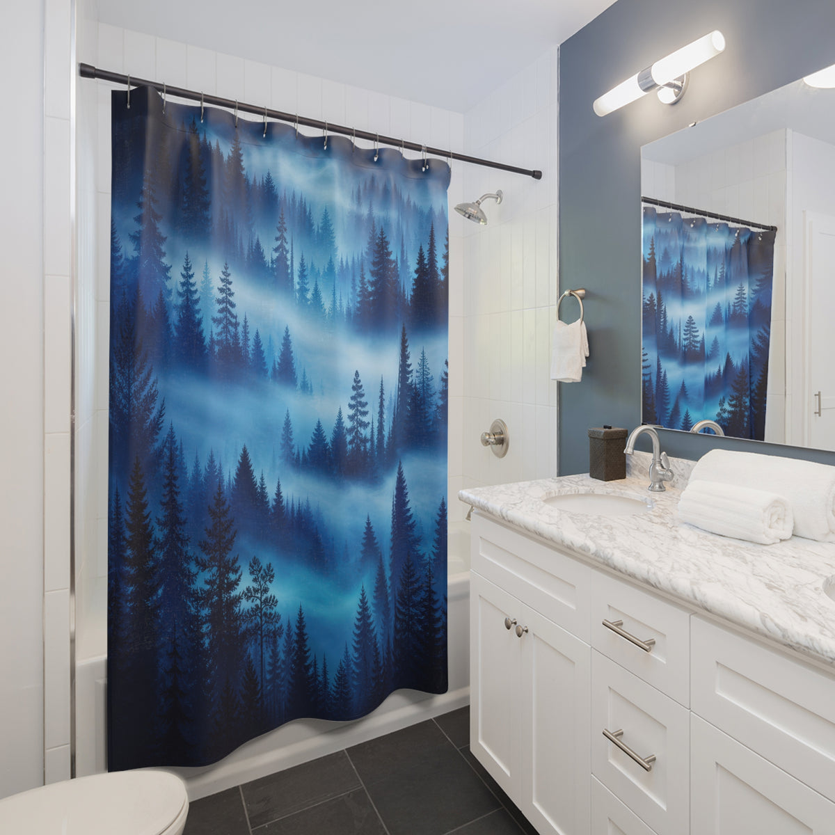Layers of blue pine forest emerging through mist shower curtain beside a white vanity