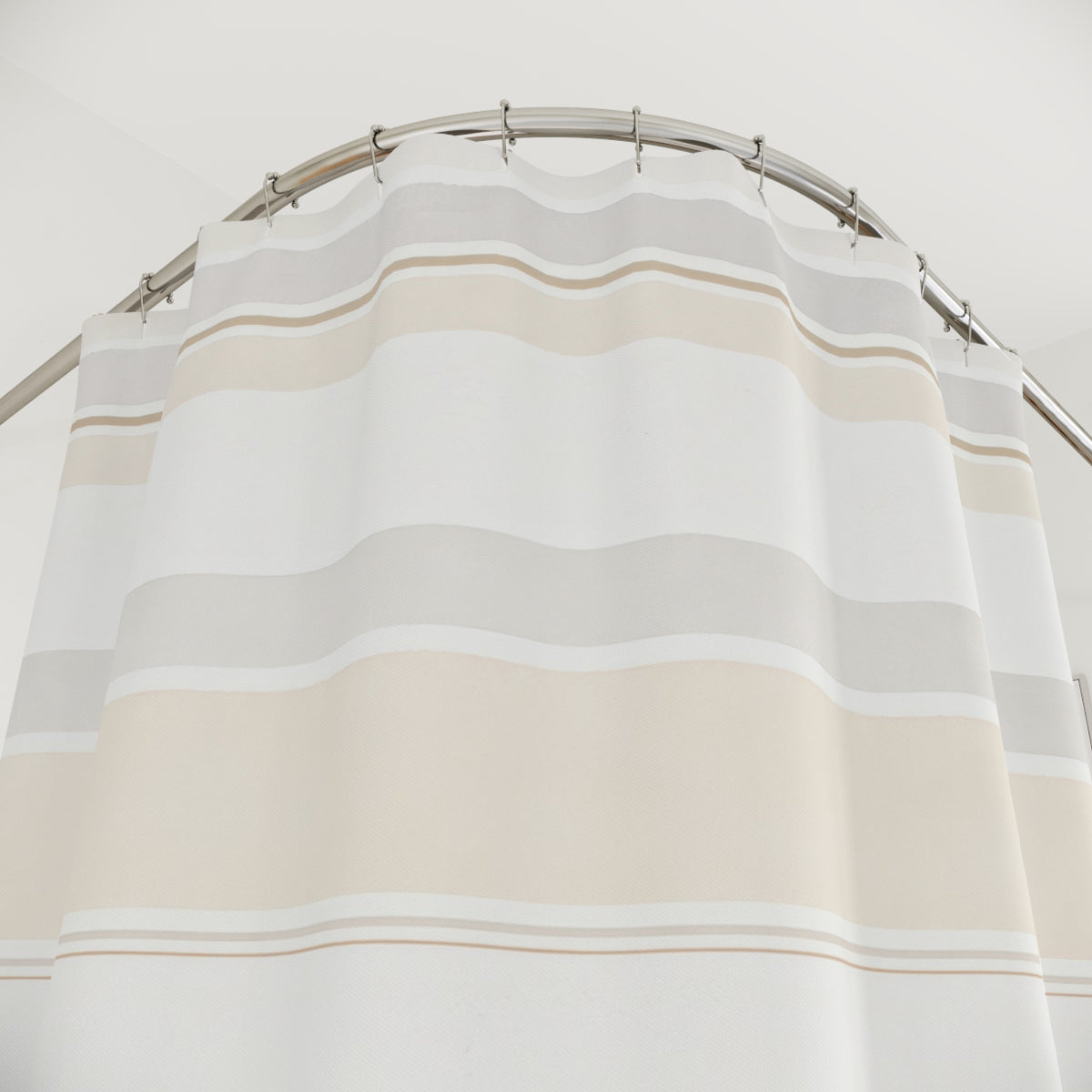 Horizontal Cream Beige Watercolor Band shower curtain with close-up print, hooks, and folds