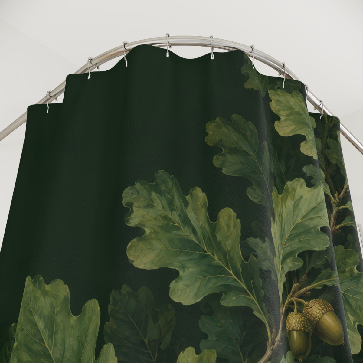 Oak leaves and acorns on forest green shower curtain with close-up print, hooks, and folds