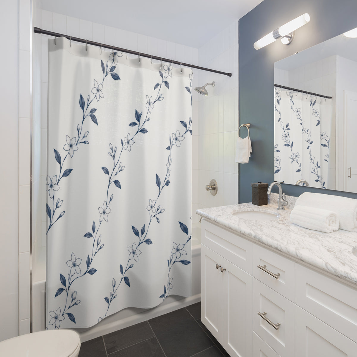 White jasmine flowers on fine navy trailing stems shower curtain beside a white vanity