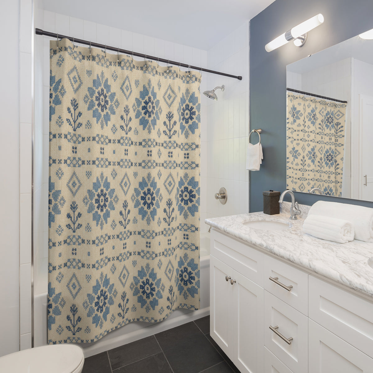 Blue Coverlet Floral farmhouse style shower curtain beside a white vanity
