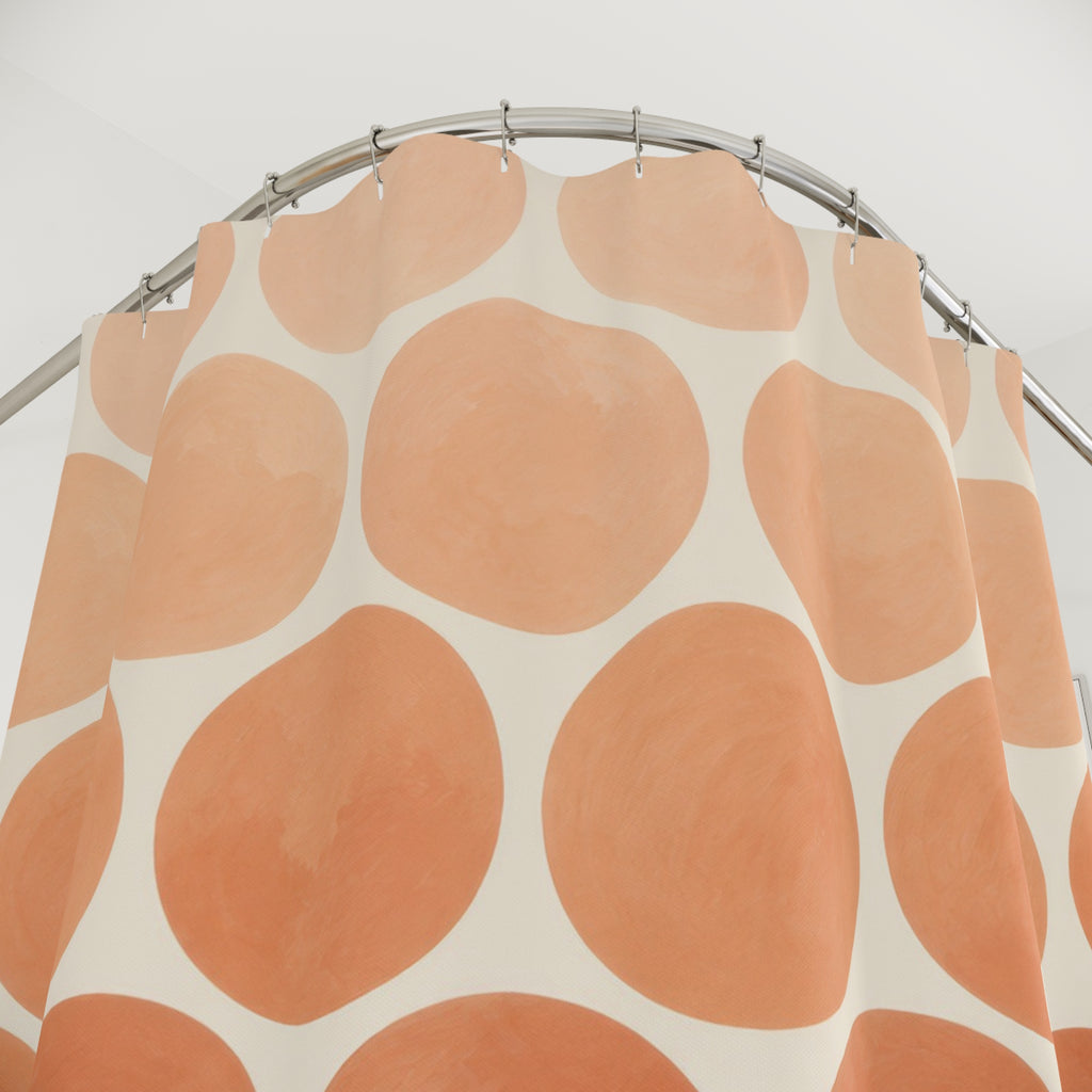 Peach to terracotta ombre dots on ivory shower curtain with close-up print, hooks, and folds