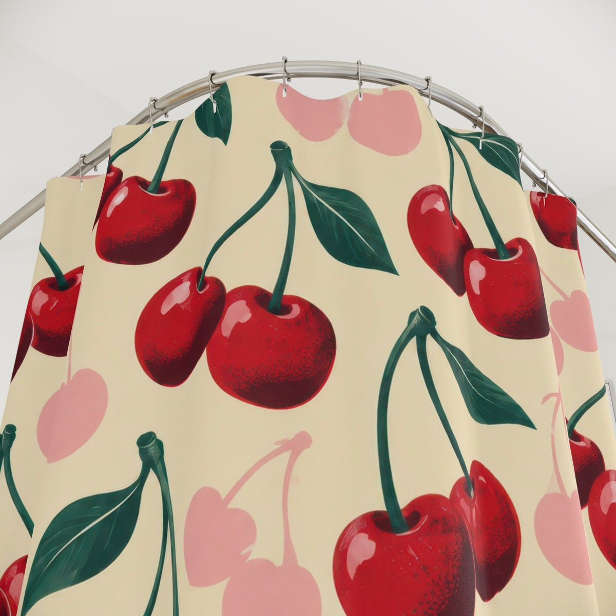 Retro red and pink cherry pattern on cream shower curtain with close-up print, hooks, and folds