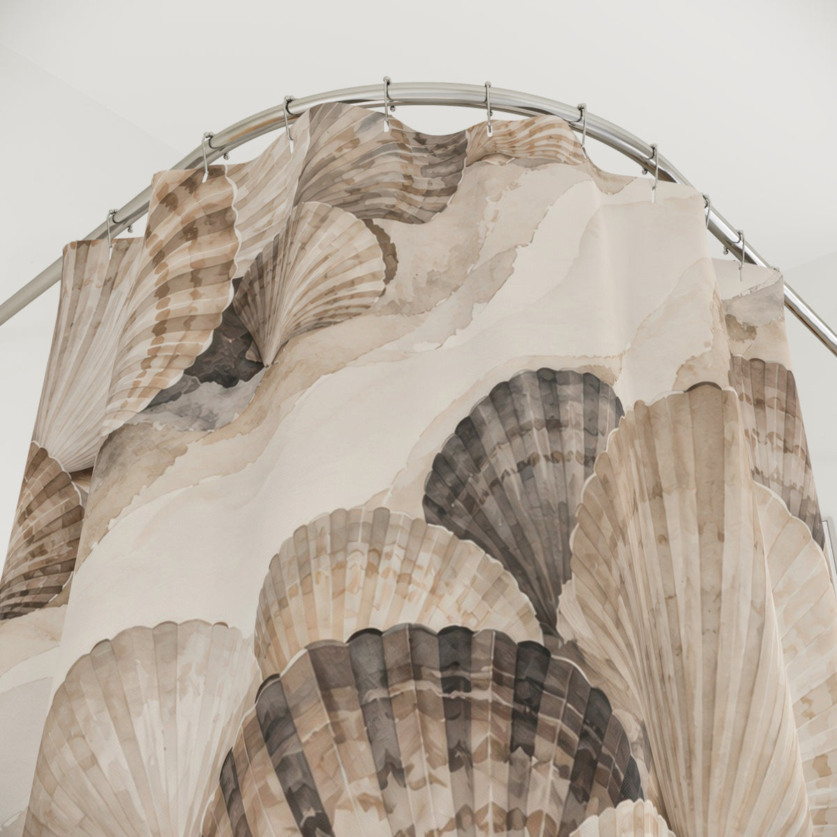 Taupe, ivory and charcoal scallop shells in diagonal clusters shower curtain with close-up print, hooks, and folds