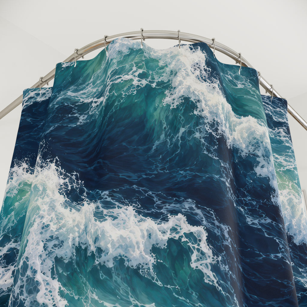 Turquoise breaking waves and white sea foam on navy water shower curtain with close-up print, hooks, and folds
