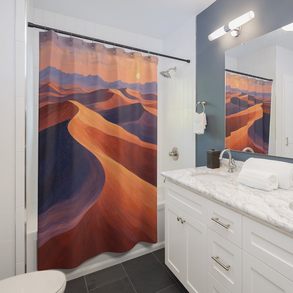 Painted orange dunes with purple canyon layers at sunset shower curtain beside a white vanity