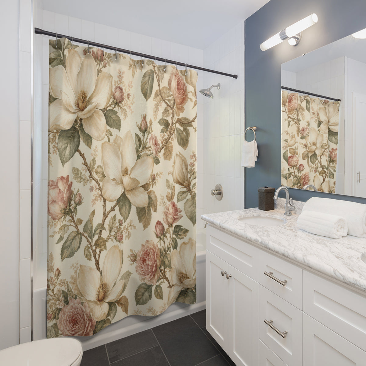 White Rose Vintage Botanical magnolia shower curtain beside a white vanity