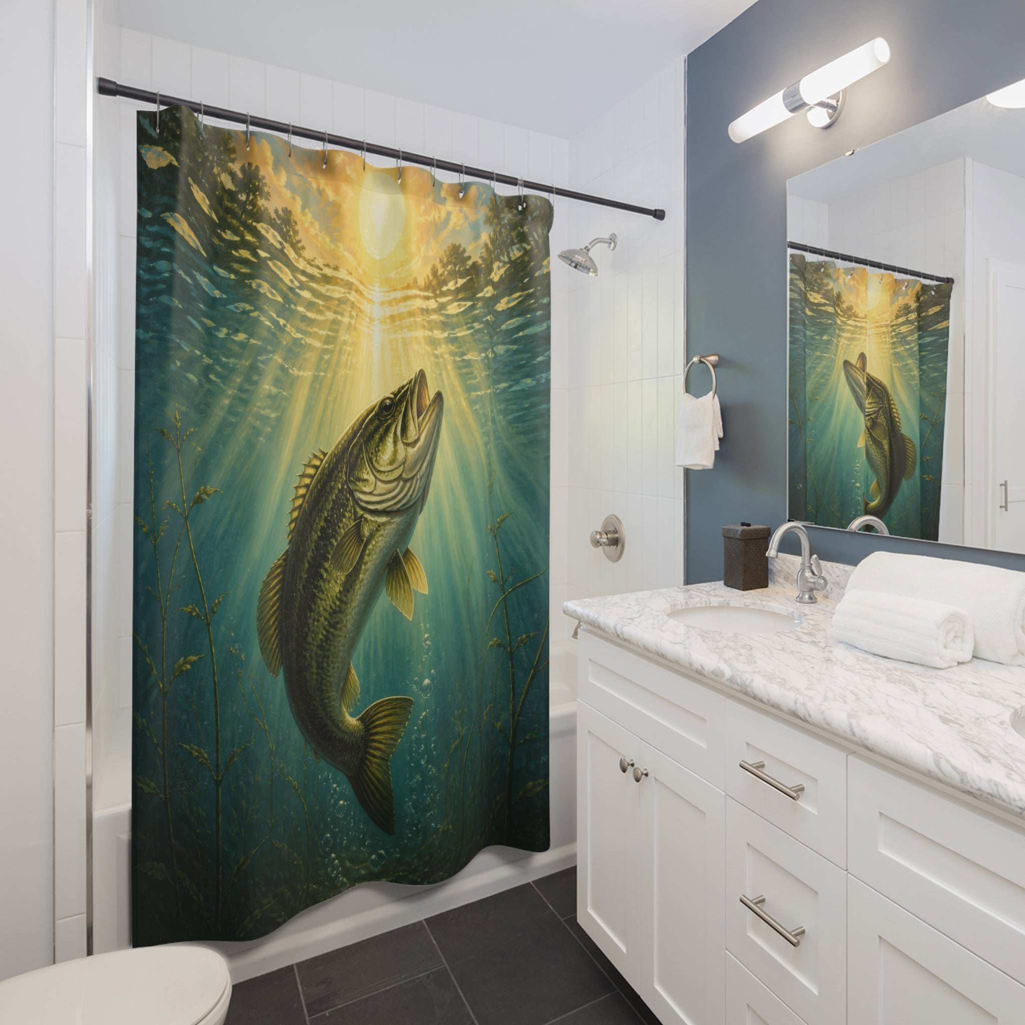 Largemouth bass rising through golden sunbeams in a teal lake shower curtain beside a white vanity