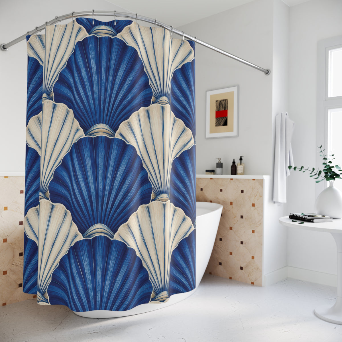 Overlapping cobalt blue and ivory scallop shells shower curtain beside a freestanding tub