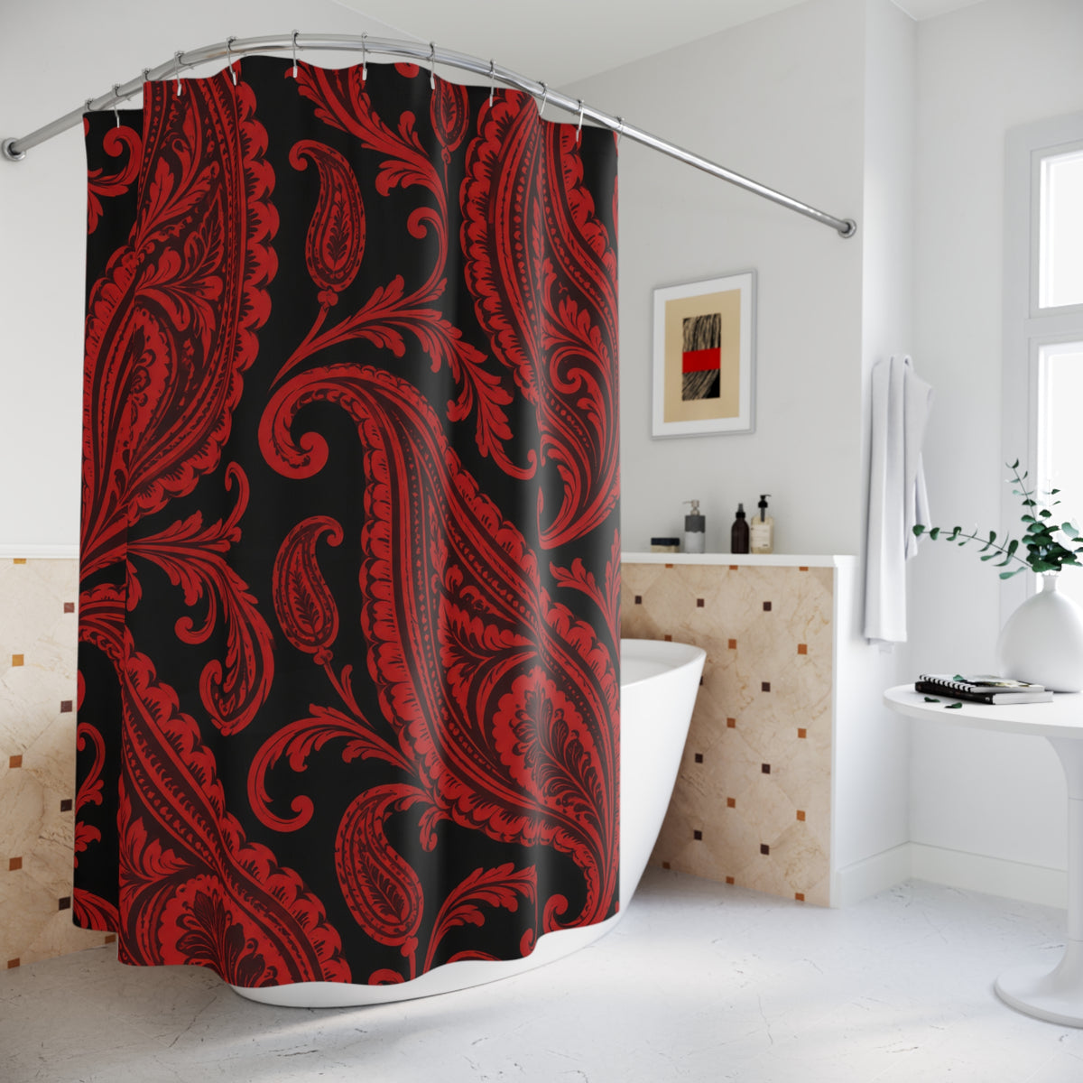 Red paisley teardrops and curling scrollwork on black shower curtain beside a freestanding tub