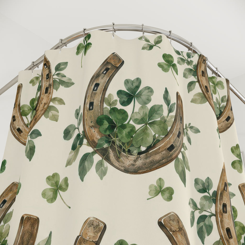 Brown horseshoes with sage clovers on cream shower curtain with close-up print, hooks, and folds