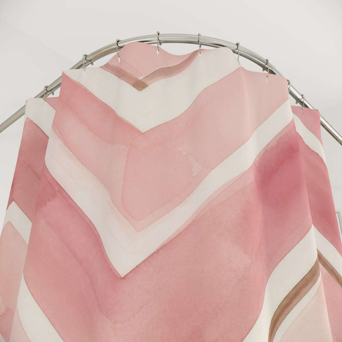 Painted blush pink and ivory chevrons with tan accents shower curtain with close-up print, hooks, and folds
