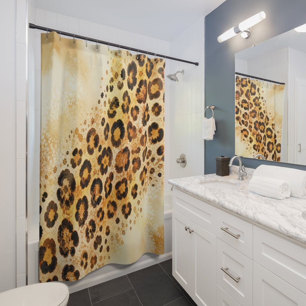 Tawny watercolor cheetah print on warm cream shower curtain beside a white vanity