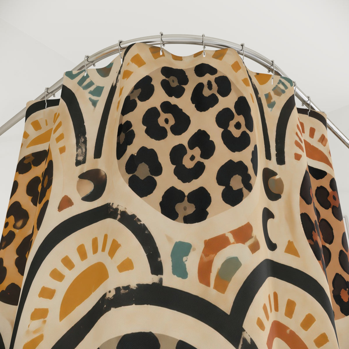 Cheetah print inside terracotta and teal boho arches shower curtain with close-up print, hooks, and folds