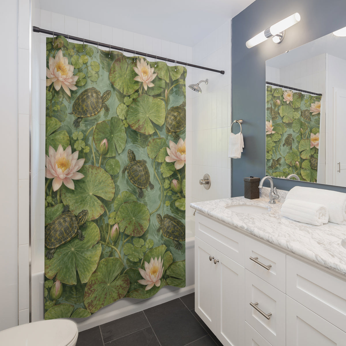 Olive turtles and pale pink water lilies shower curtain beside a white vanity