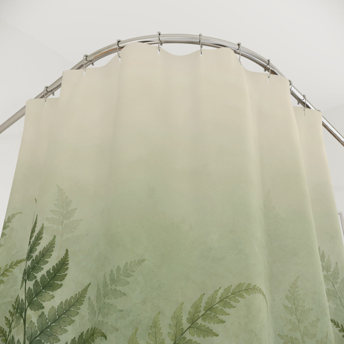 Sage and forest green ferns fading into ivory mist shower curtain with close-up print, hooks, and folds