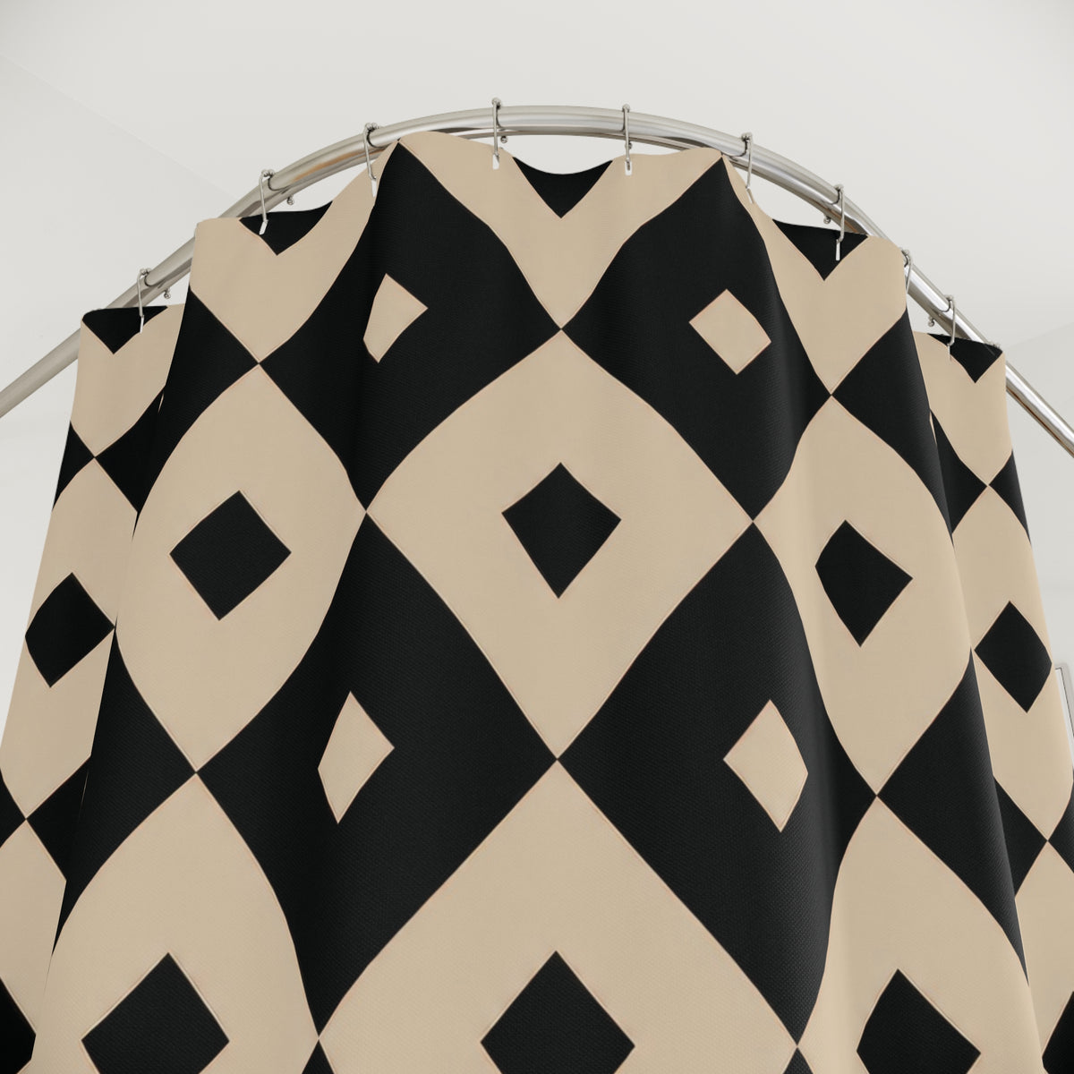 Beige and black inset diamond checks shower curtain with close-up print, hooks, and folds
