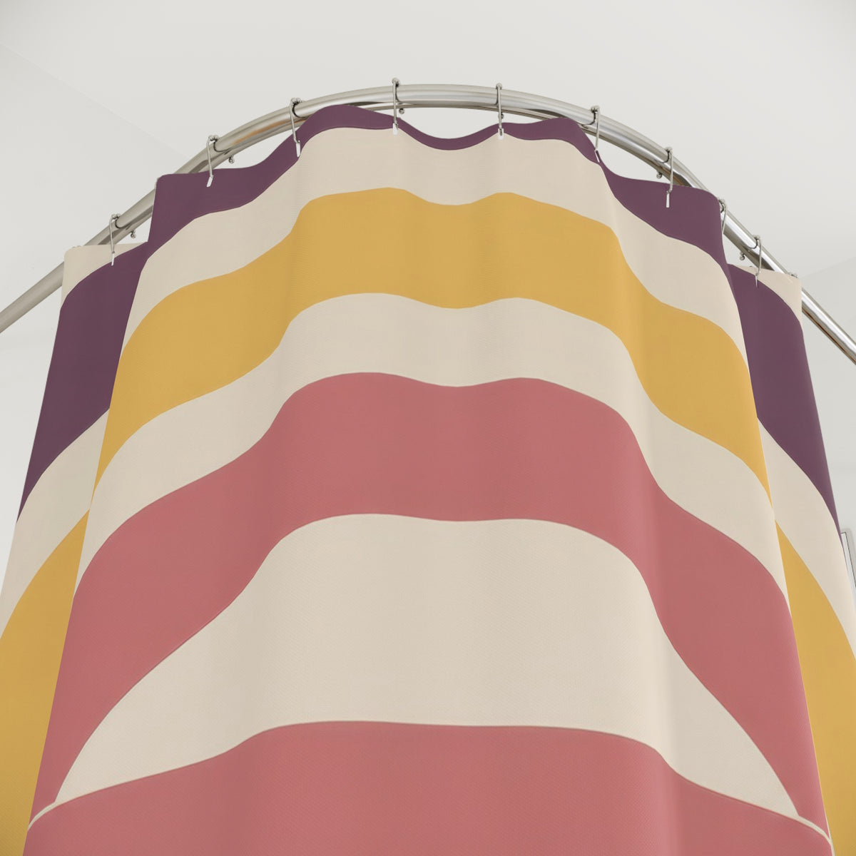 Nested wide arch stripes in plum yellow rose cream and brick shower curtain with close-up print, hooks, and folds