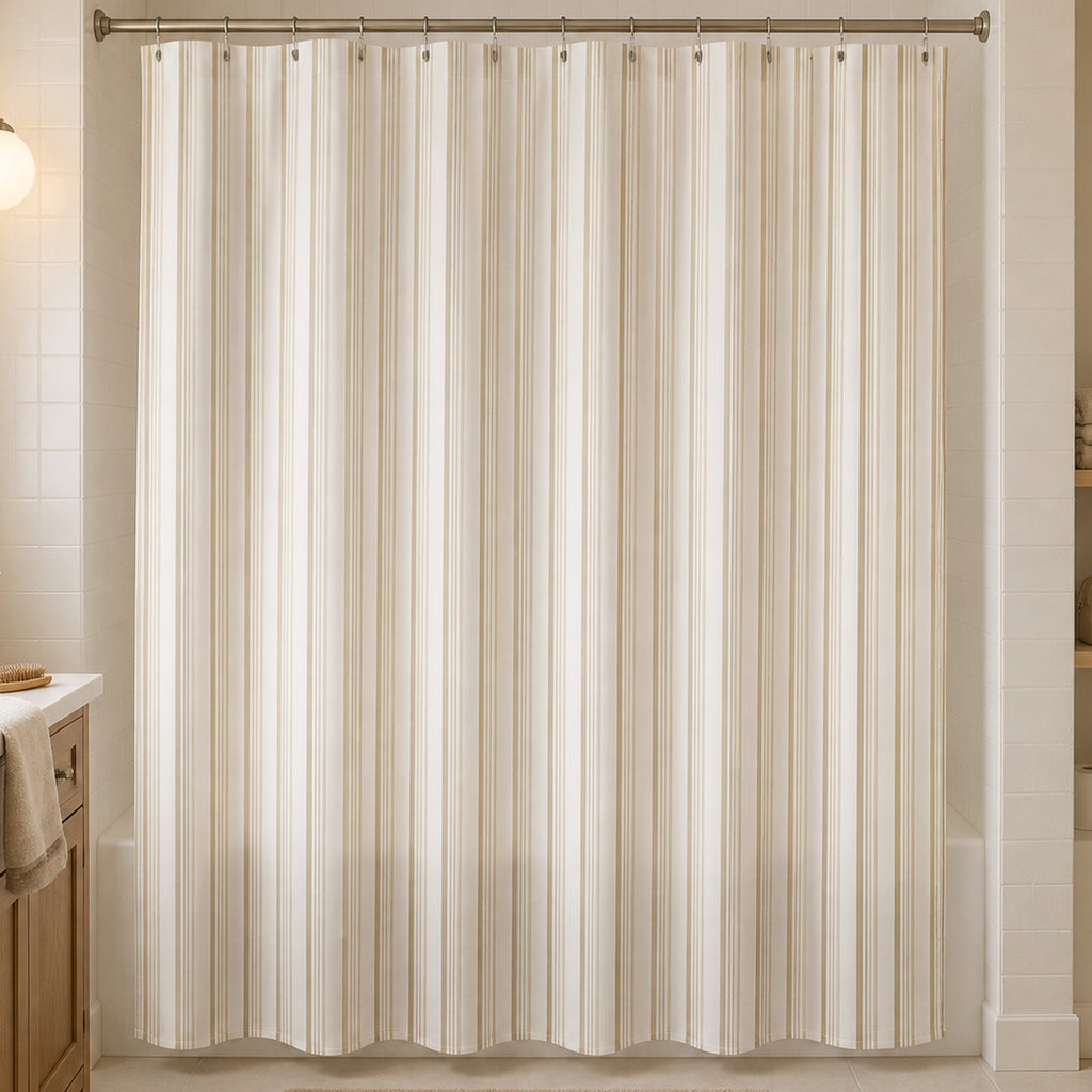 Cream tone-on-tone striped shower curtain in an attainable warm-neutral guest bathroom with oak vanity