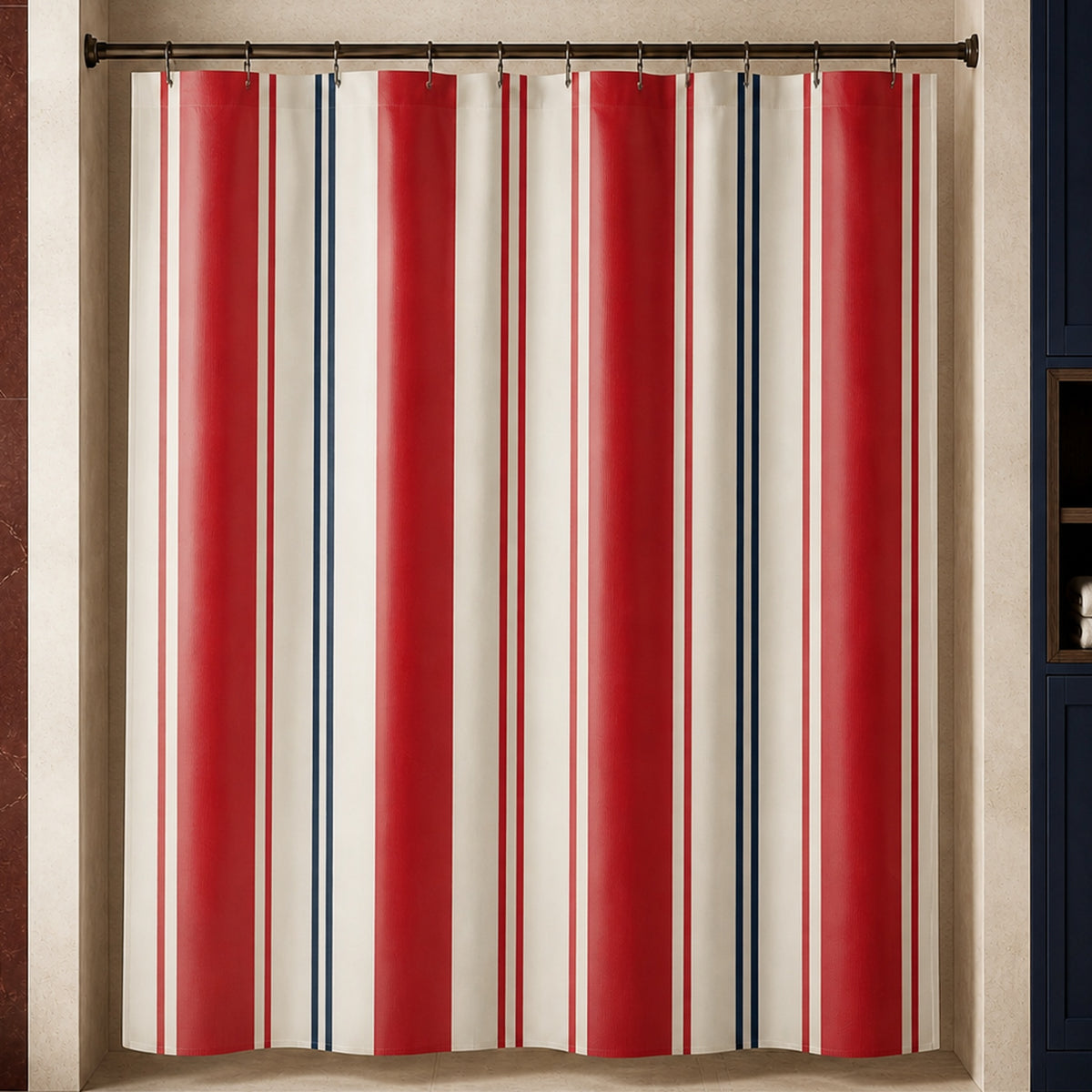 Regatta red, navy and ivory striped shower curtain in a luxury travertine bathroom with oxblood stone and navy cabinetry